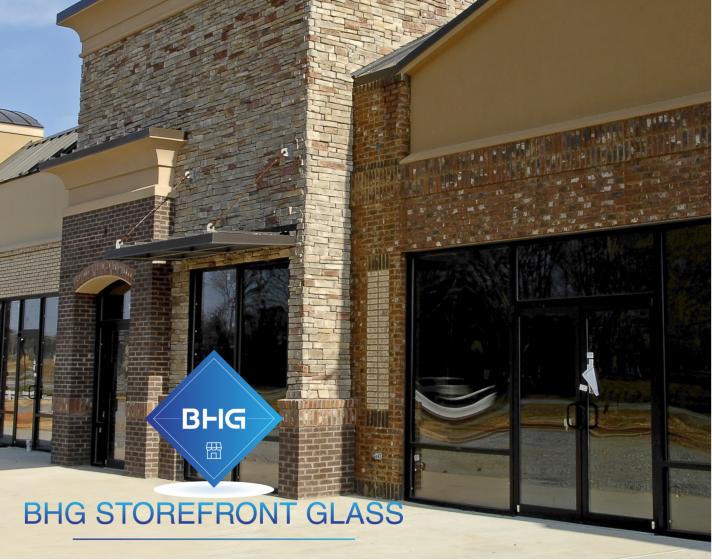 Glass storefront repair on a dark-framed retail front